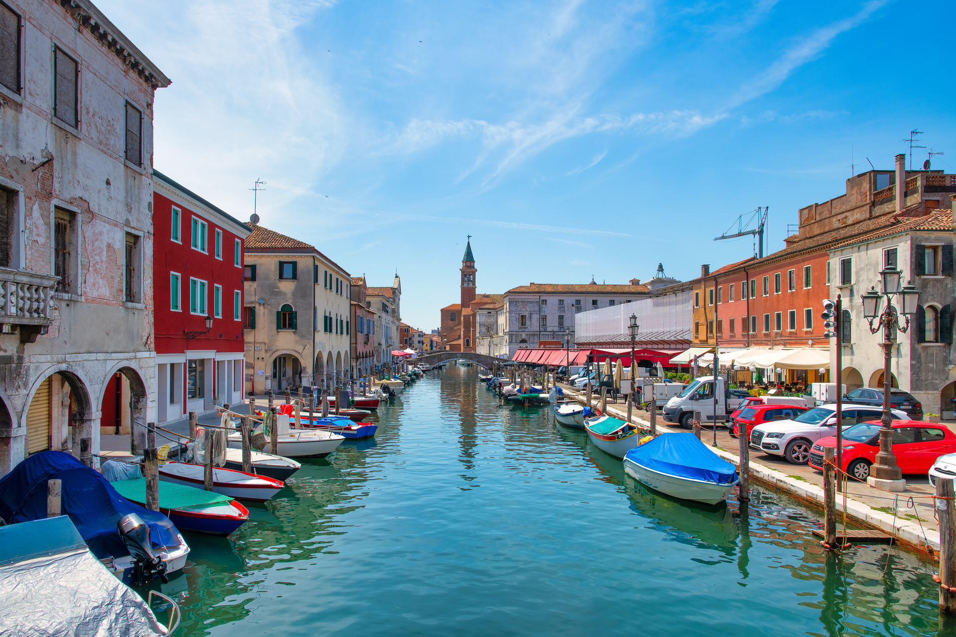 Gondolas moored on a Venetian canal at golden hour
